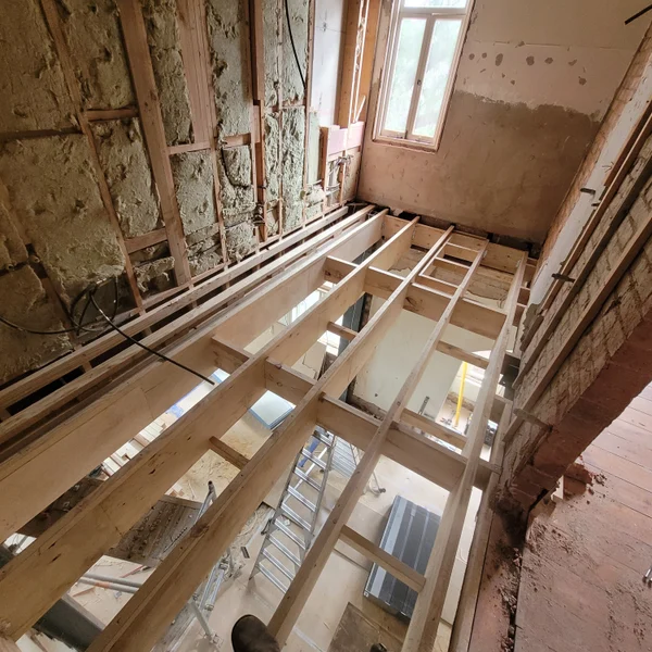 Floor joists being replaced in a heritage home renovation