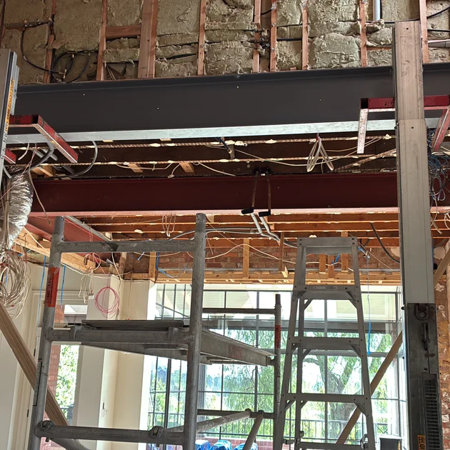 Structural steel beams installed for a home extension